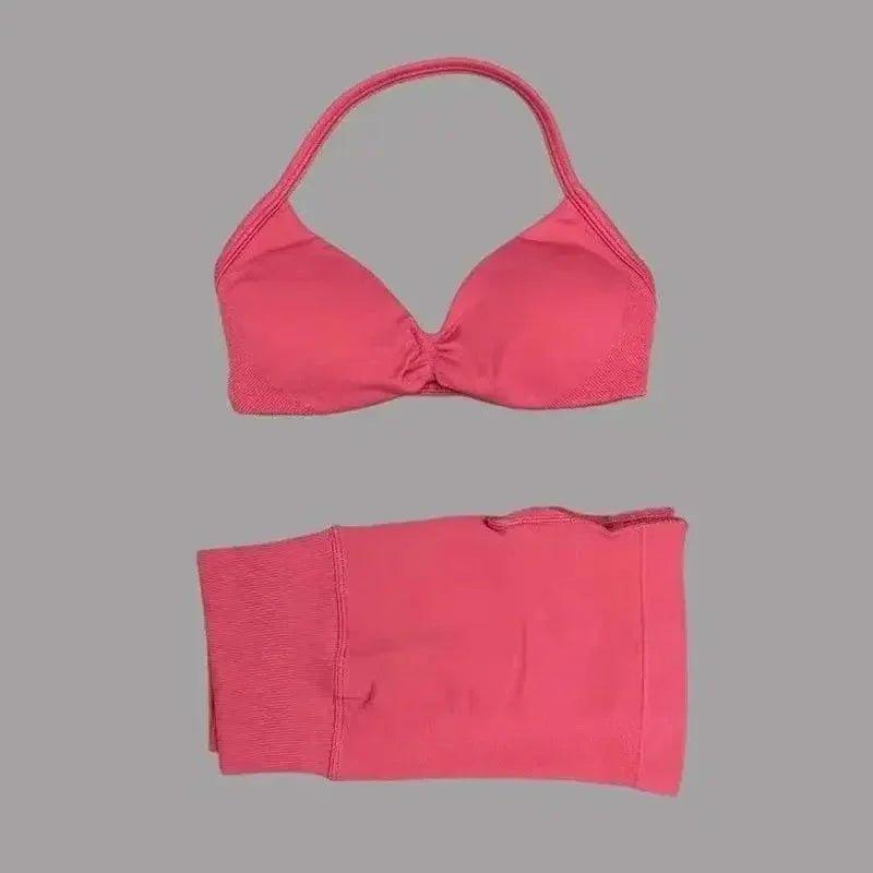 Pink halter neck bikini top and matching bottoms for women's fashion