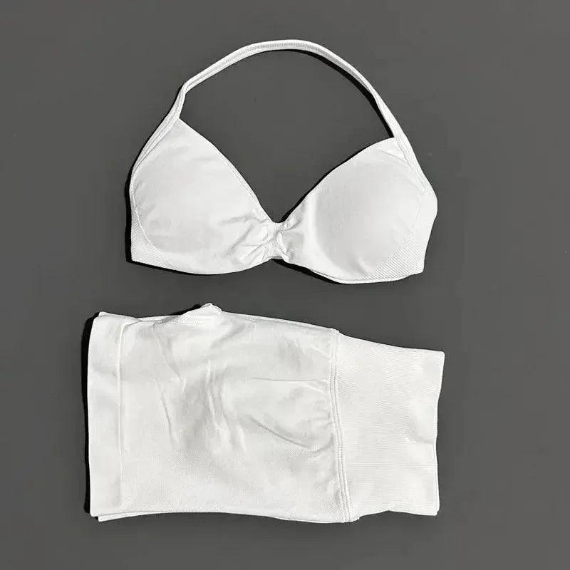 White women's bikini set with halter top and high-waisted bottoms