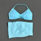Light blue women's bikini set with halter top and matching bottoms