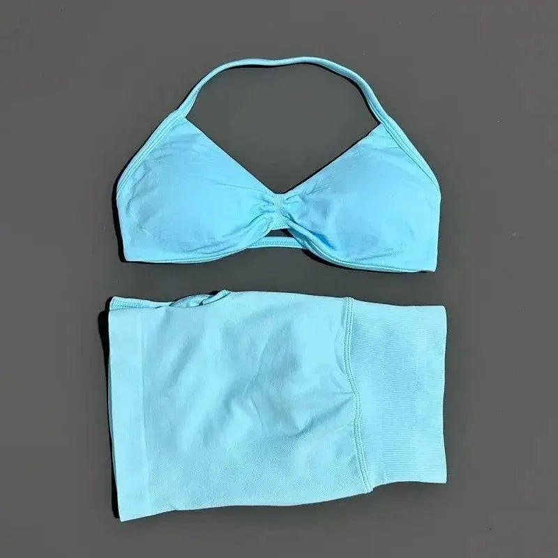 Light blue women's bikini set with halter top and matching bottoms
