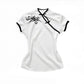 White women's fashion top with black trim and tribal print, stylish short sleeve blouse