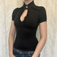 Black ruffled wrap top with keyhole neckline and puff sleeves for women's fashion