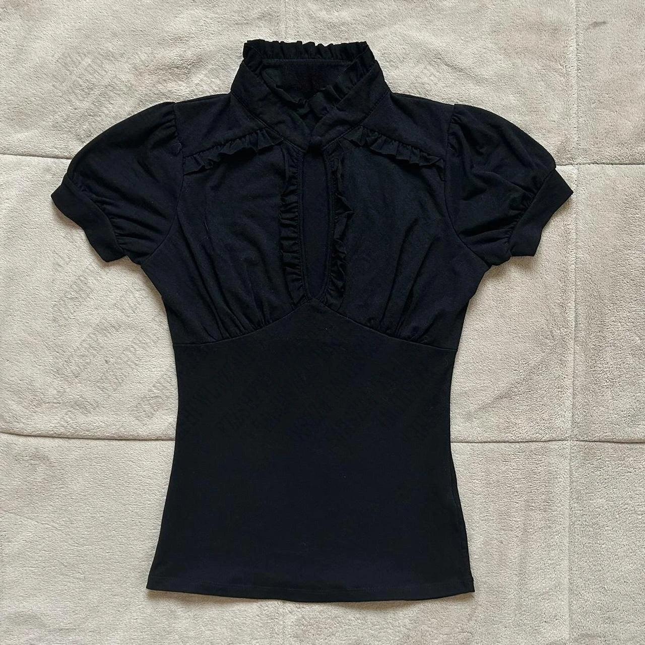 Black women's blouse with ruffled high neck and puff sleeves, elegant fashion top