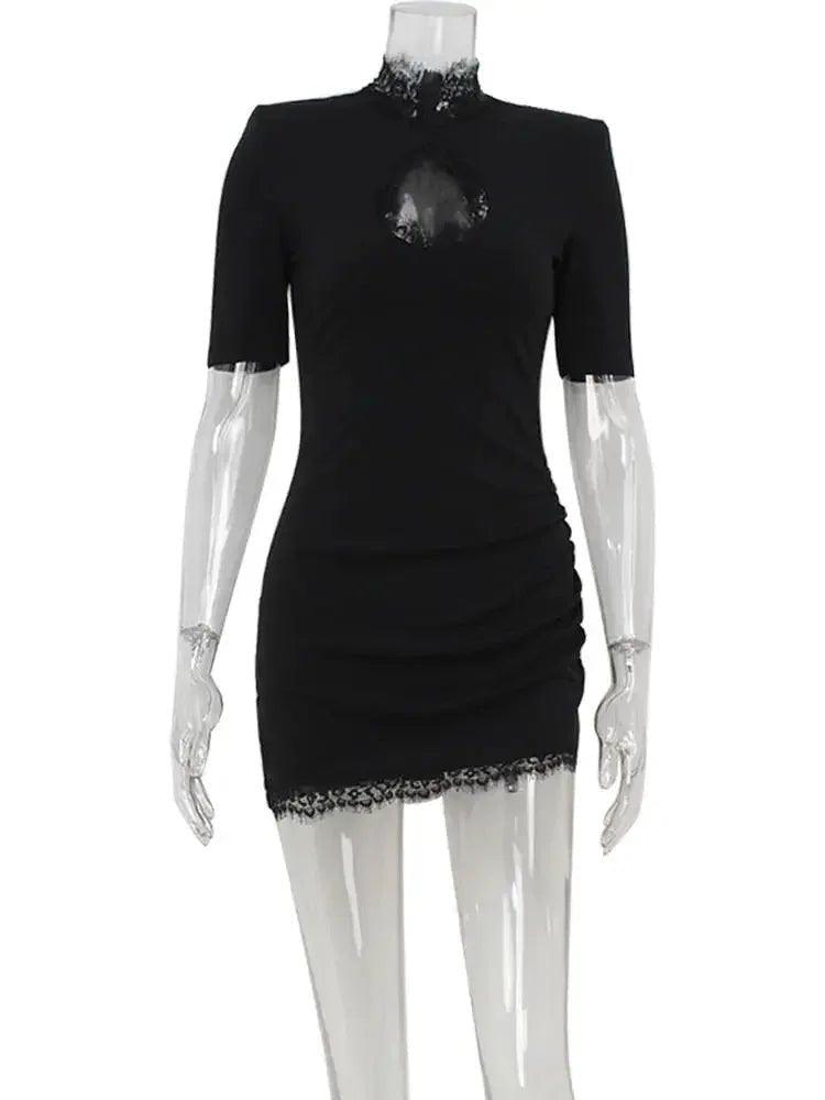 Black lace-trimmed mini dress with ruched detail and high neck, perfect for women's fashion