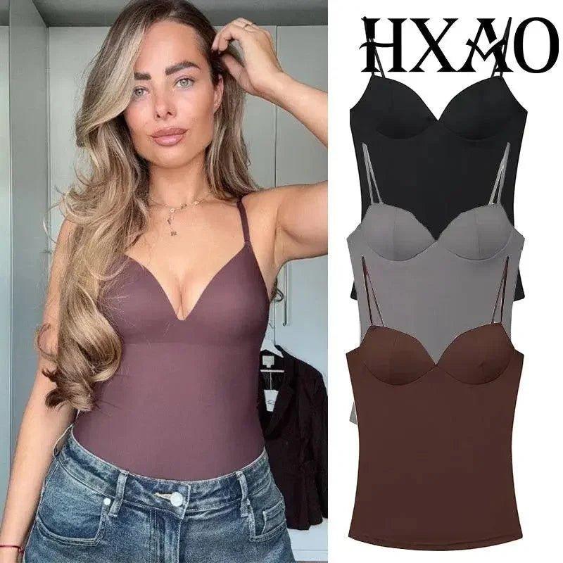 Woman modeling mauve V-neck bodysuit with matching black, gray, brown styles — women's fashion tops