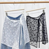 Women's floral lace overlay tops in white and black, stylish fashion layering pieces
