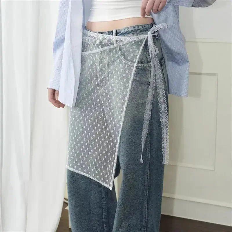 Sheer lace wrap skirt with polka dots, styled over jeans for women's fashion