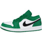 Green and white low-top sneaker with black swoosh, women's fashion footwear