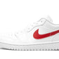 White low-top sneaker with red swoosh, stylish women's fashion footwear