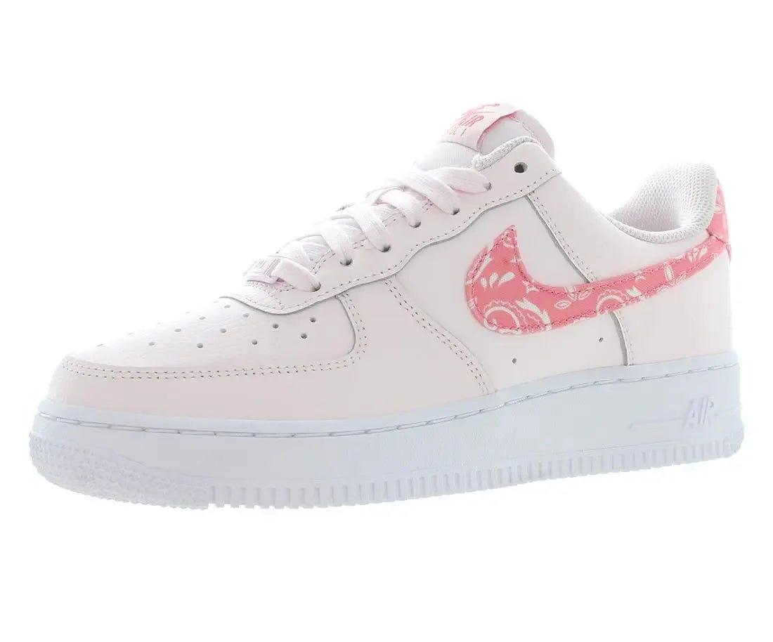White women's sneaker with pink floral Swoosh, casual fashion footwear for everyday style