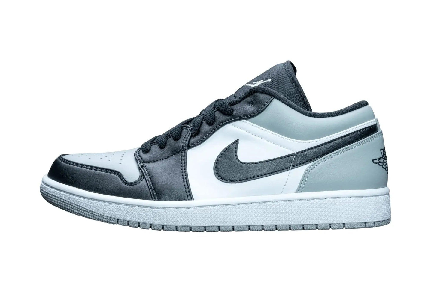 Women's black and white low-top sneaker with Nike swoosh and Jumpman logo, casual fashion footwear