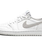 White women's low-top sneaker with gray accents and Nike swoosh, ideal for casual fashion