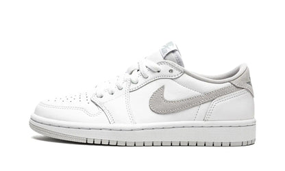 White women's low-top sneaker with gray accents and Nike swoosh, ideal for casual fashion