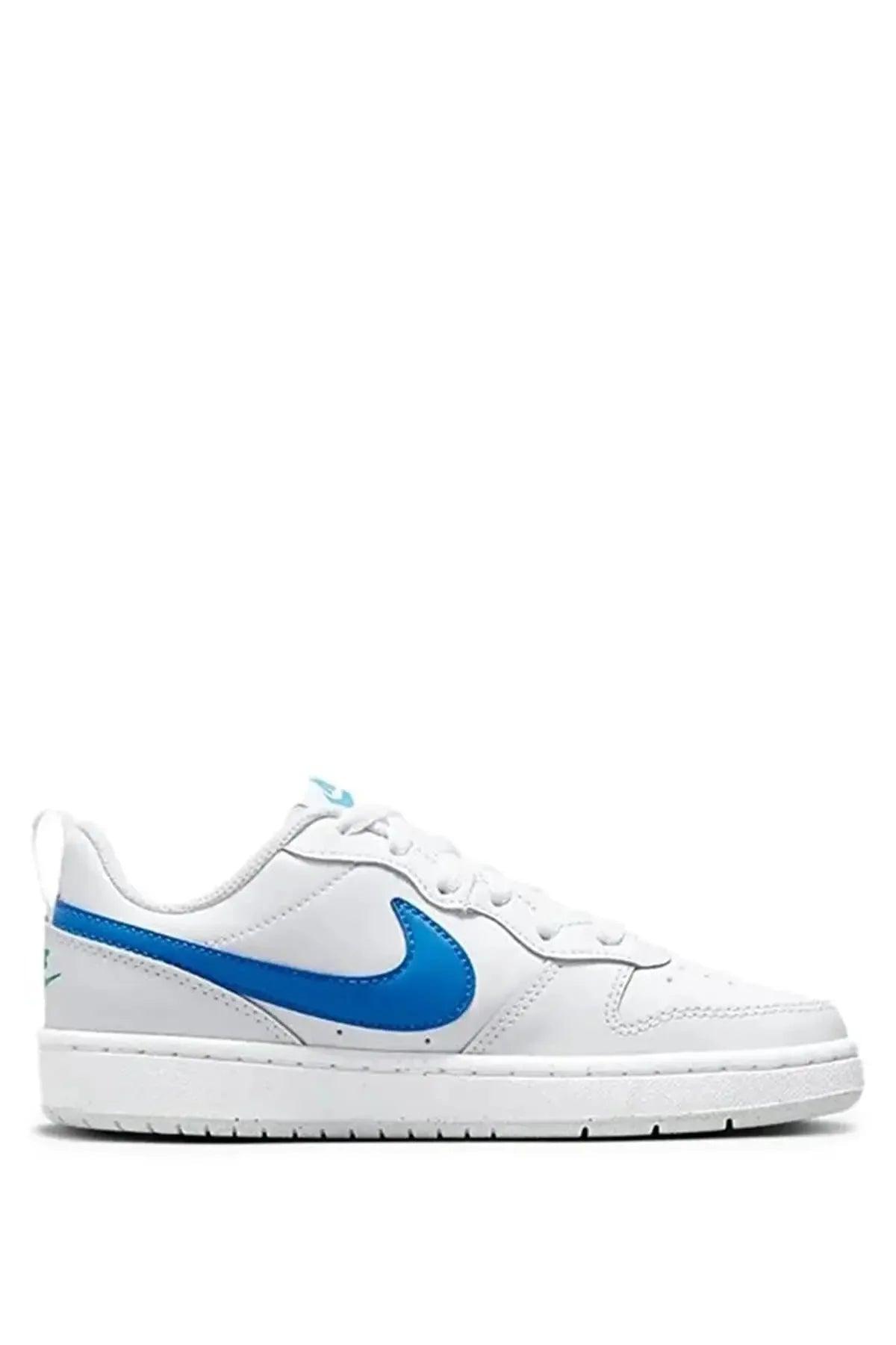 White women's sneaker with blue Nike swoosh, casual fashion footwear