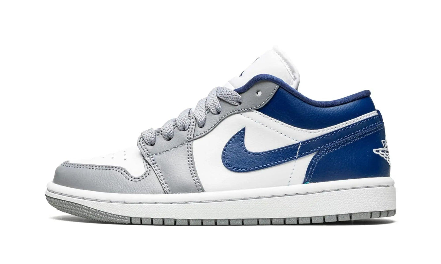 Women's white and blue low-top sneaker with gray accents and Nike swoosh, fashion footwear