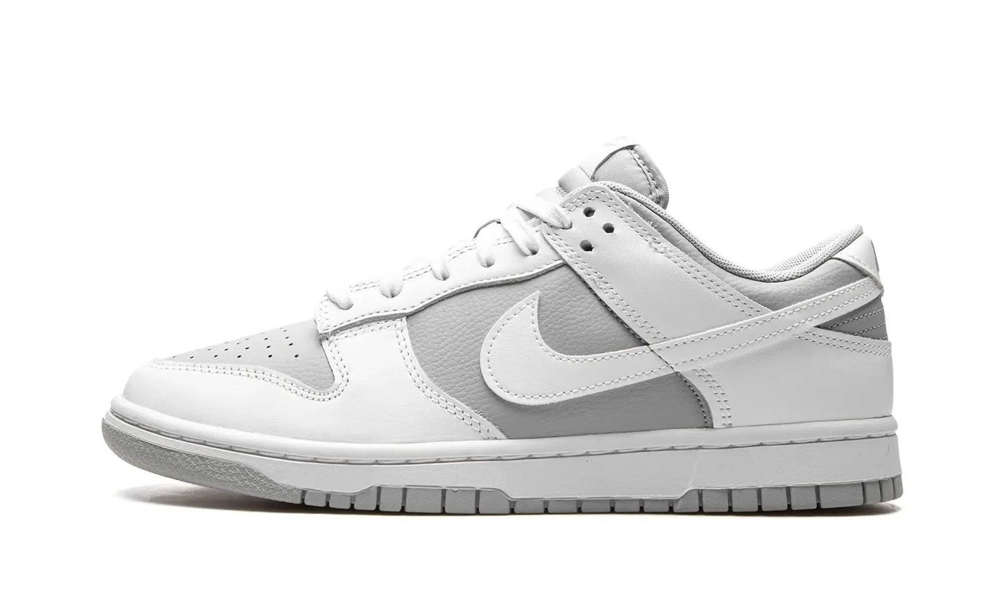 White and gray Nike Dunk Low sneaker, women's fashion footwear with classic design and clean look