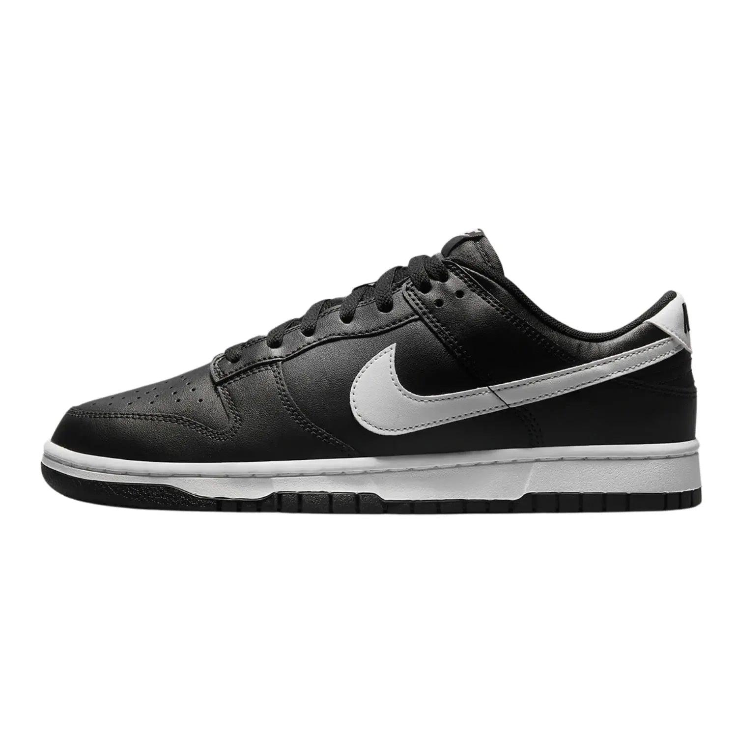 Black and white Nike Dunk Low sneaker with iconic Swoosh, perfect for women's fashion and streetwear styles.
