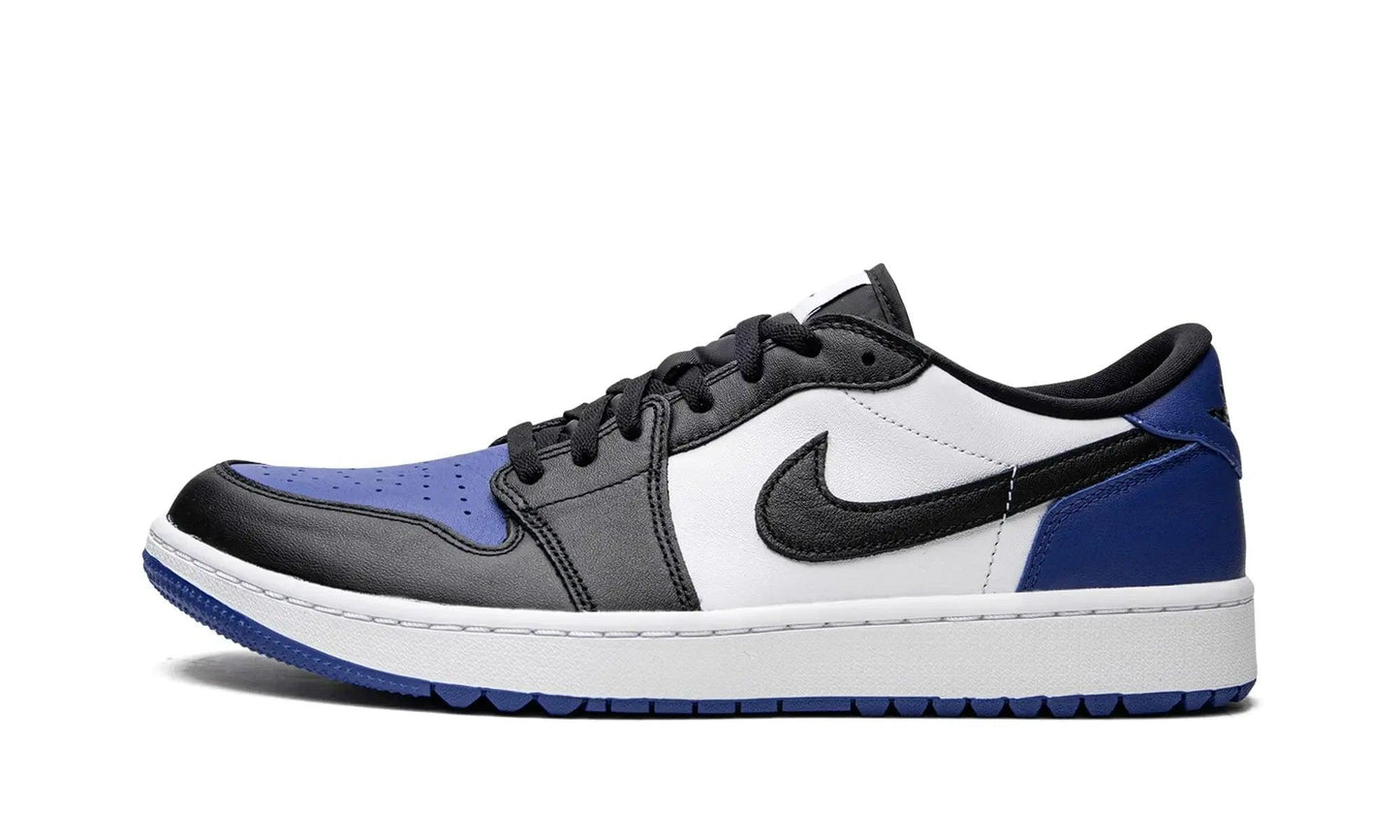 Women's Nike Air Jordan 1 Low sneaker in white, black, and royal blue, stylish fashion footwear