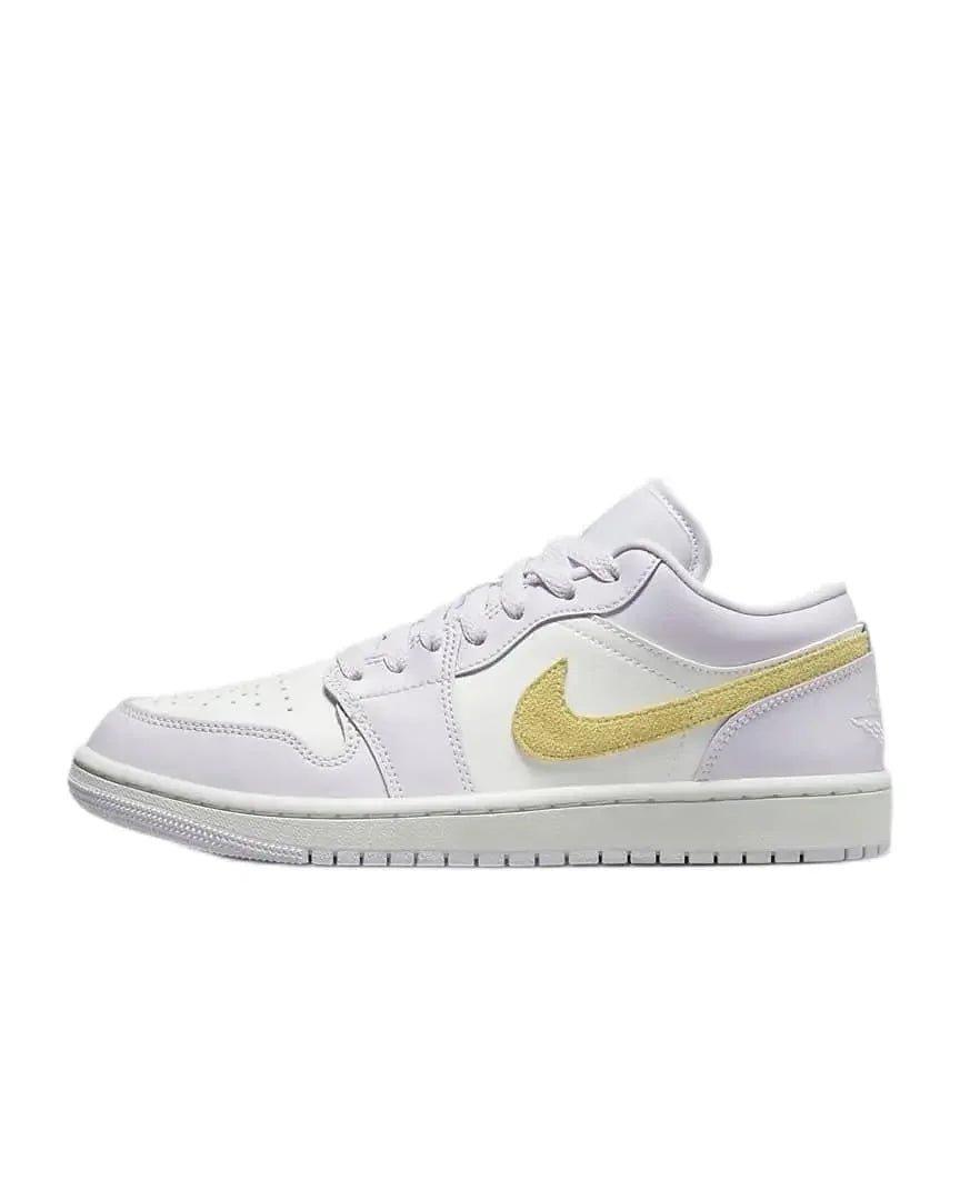 White women's sneaker with gold glitter Nike swoosh, low-top fashion shoe
