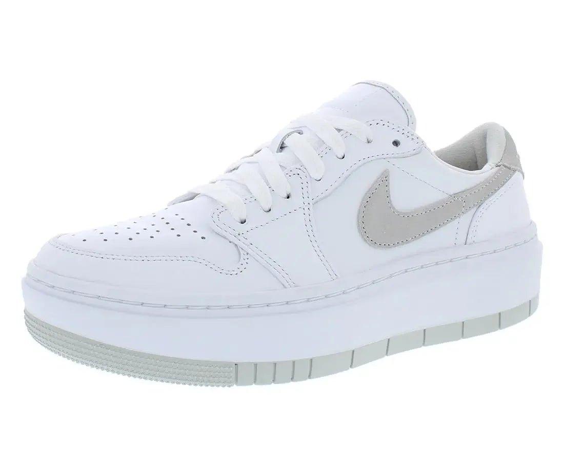 White women's platform sneaker with gray swoosh, perfect for casual fashion and everyday style