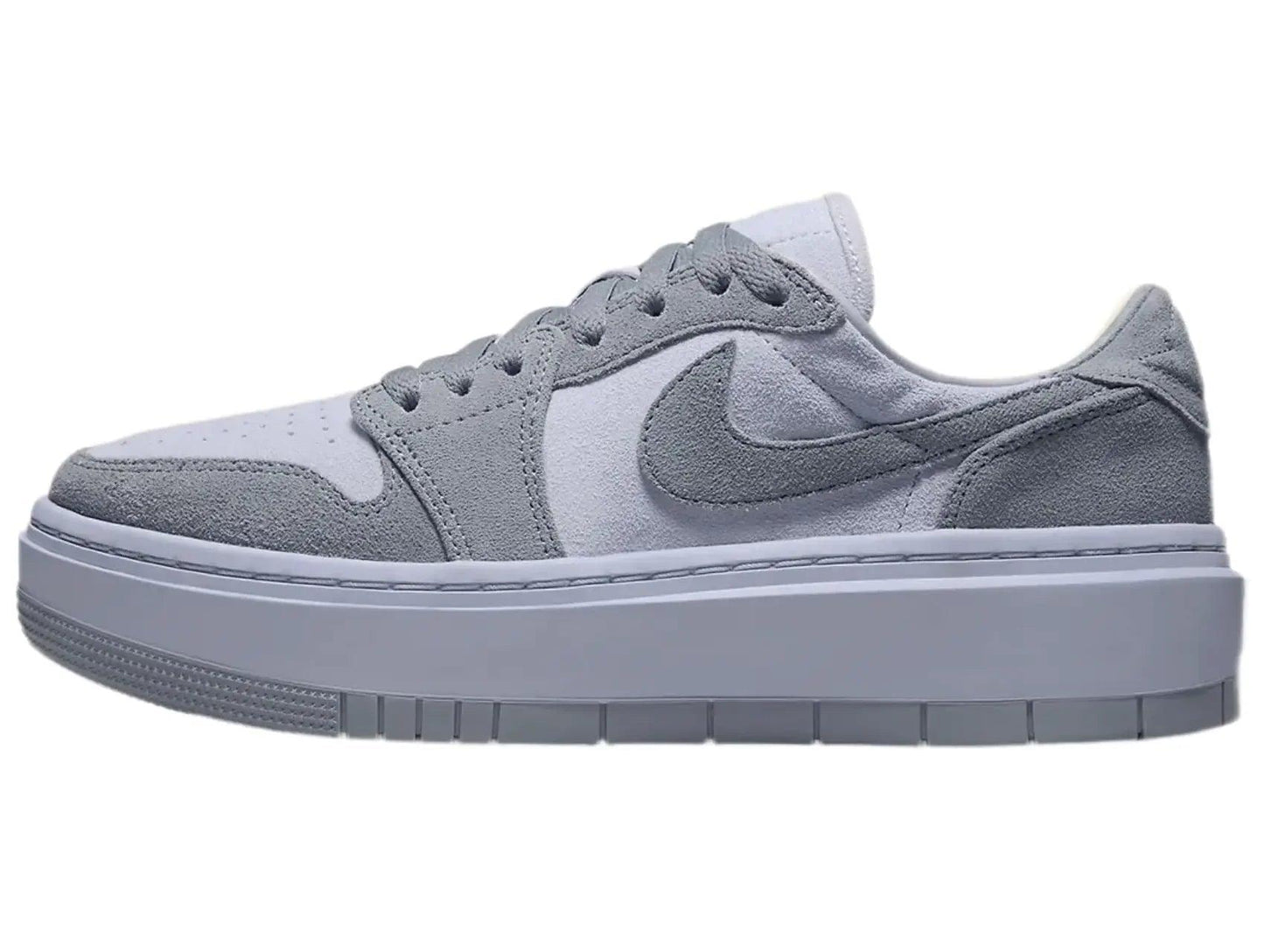 Gray suede women's platform sneaker with white sole and Nike swoosh