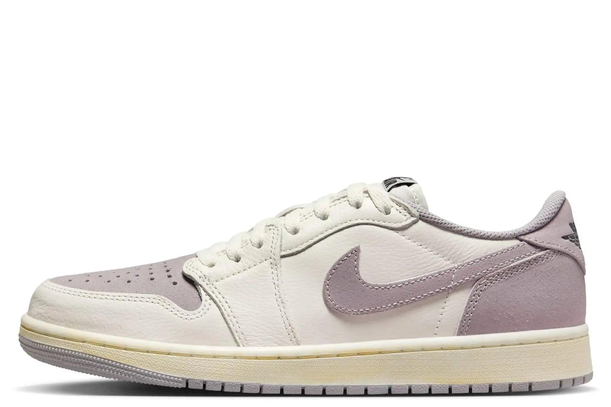 Women's white and lavender Nike Air Jordan 1 low sneaker with suede accents and classic design