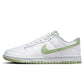 White women's sneaker with mint green swoosh and sole, casual fashion footwear