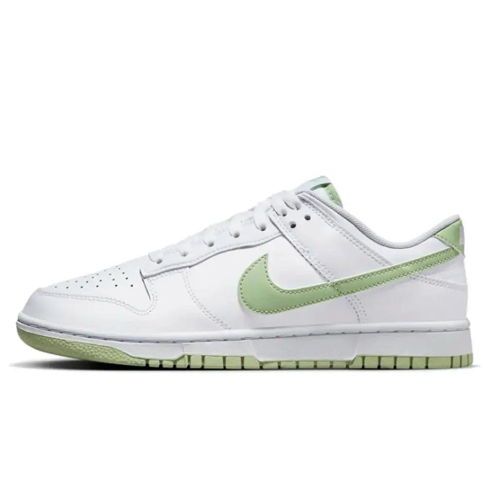 White women's sneaker with mint green swoosh and sole, casual fashion footwear