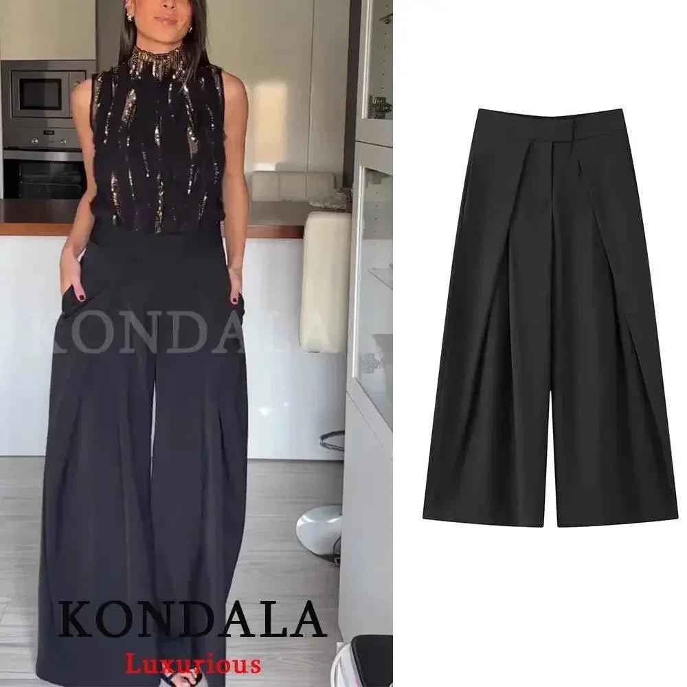 Black wide-leg pleated pants for women, paired with sequin top, stylish fashion outfit
