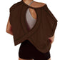 Brown open-back women's workout top with crisscross straps and black shorts, stylish gym fashion