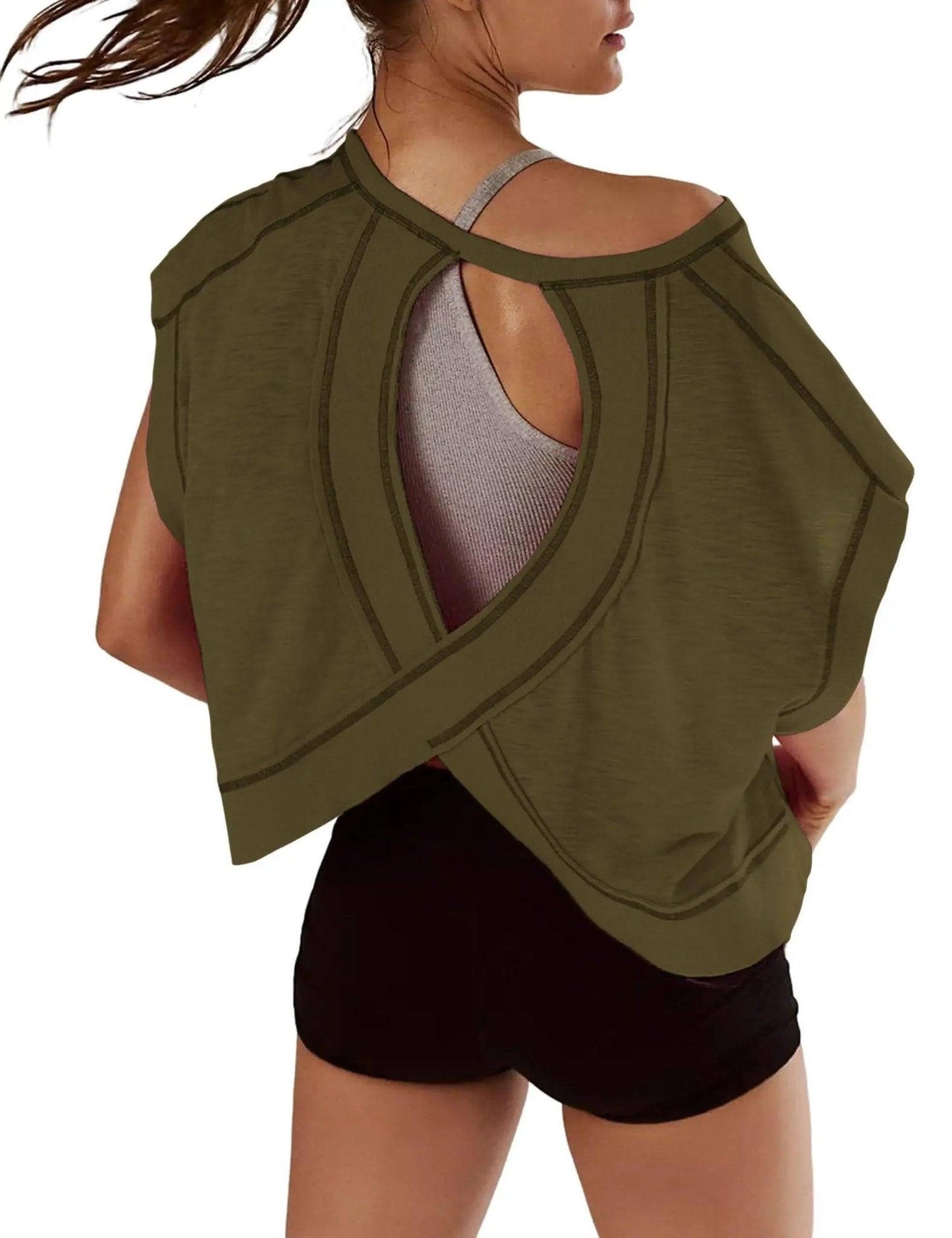 Olive green women's workout top with open back design, paired with black shorts for gym or yoga fashion.