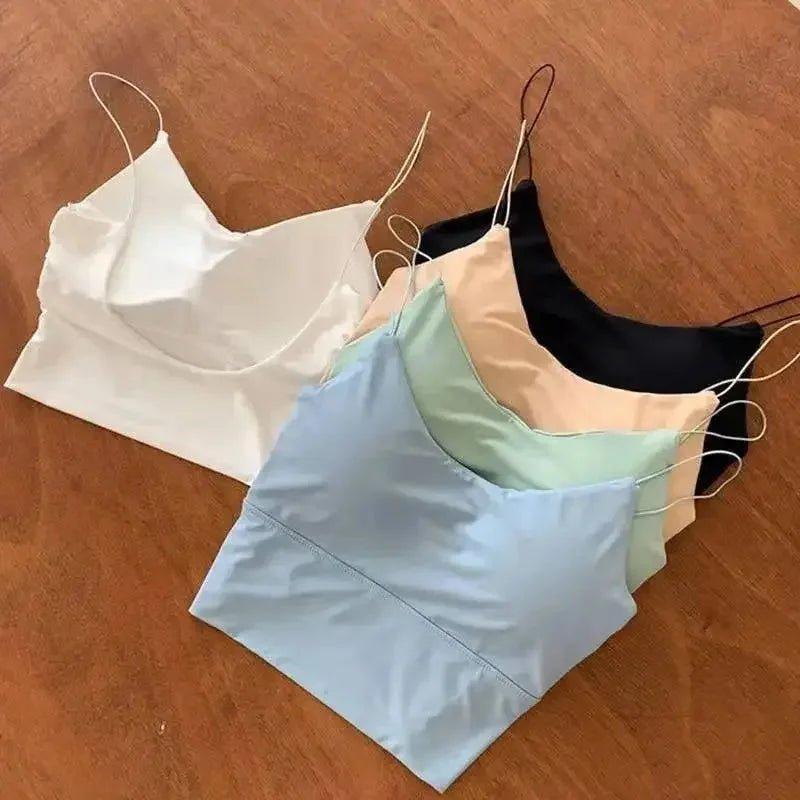 Women's satin camisole tops in white, black, beige, mint, and light blue — stylish fashion layering pieces