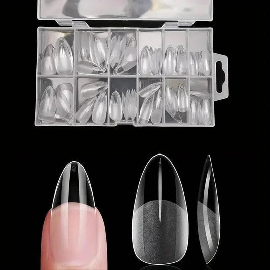 Clear stiletto false nails in organized case, perfect for women's fashion and beauty looks