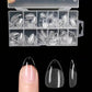 Clear false nail tips in organizer box, assorted sizes for manicure and nail art, shown on finger and close-up