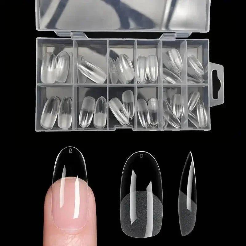 Clear false nails in organizer, assorted shapes for manicure, press-on nail tips for women's fashion
