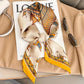 Elegant horse-print silk scarf styled with sunglasses and beige blazer for women's fashion