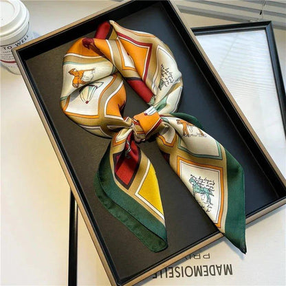 Elegant women's silk scarf with vintage horse print, styled in gift box for fashion accessories