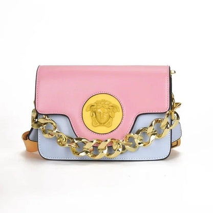 Pink and blue women's fashion handbag with gold chain strap and Medusa emblem