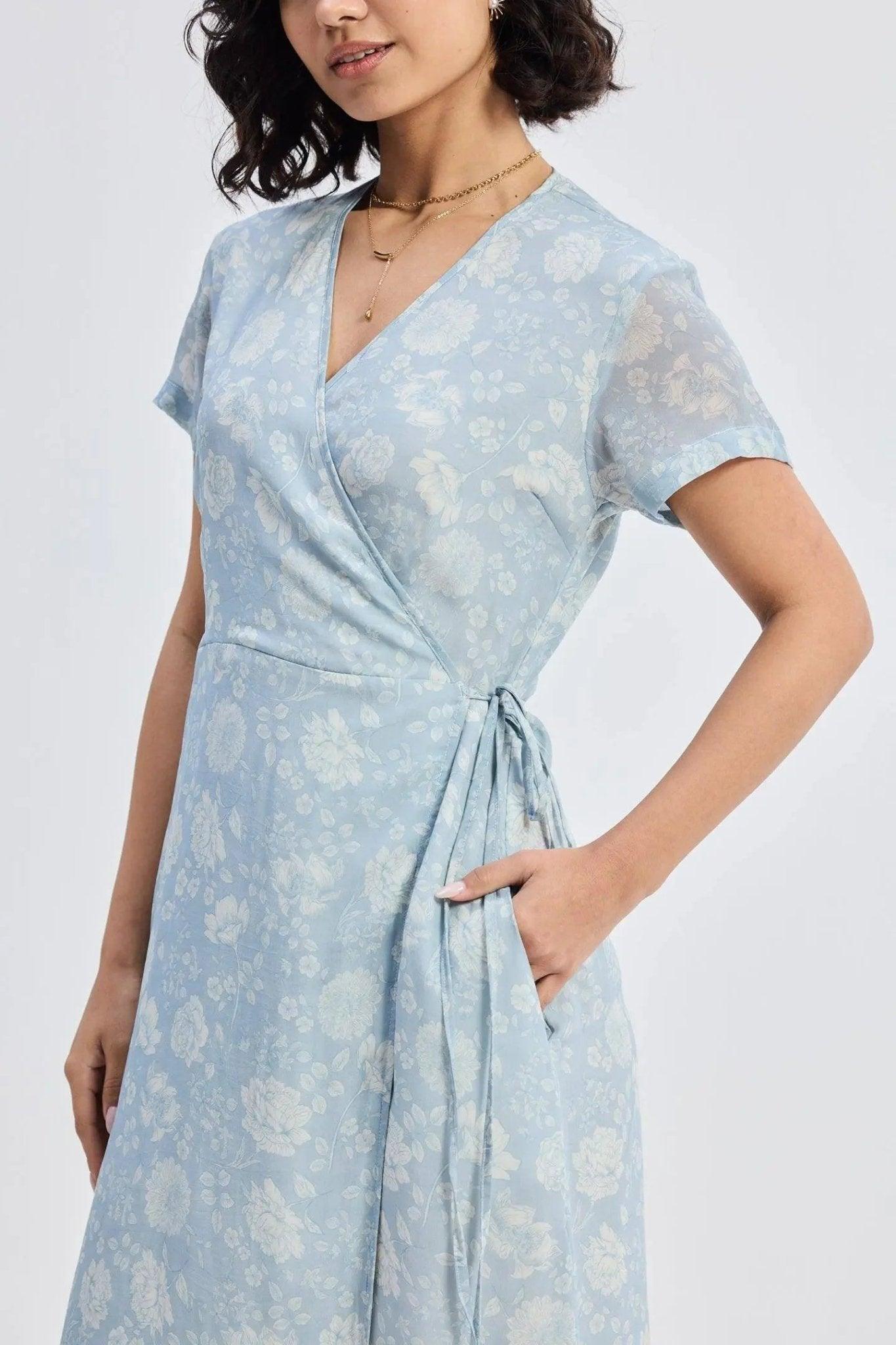 Light blue floral wrap dress with short sleeves and V-neck, perfect for women's fashion