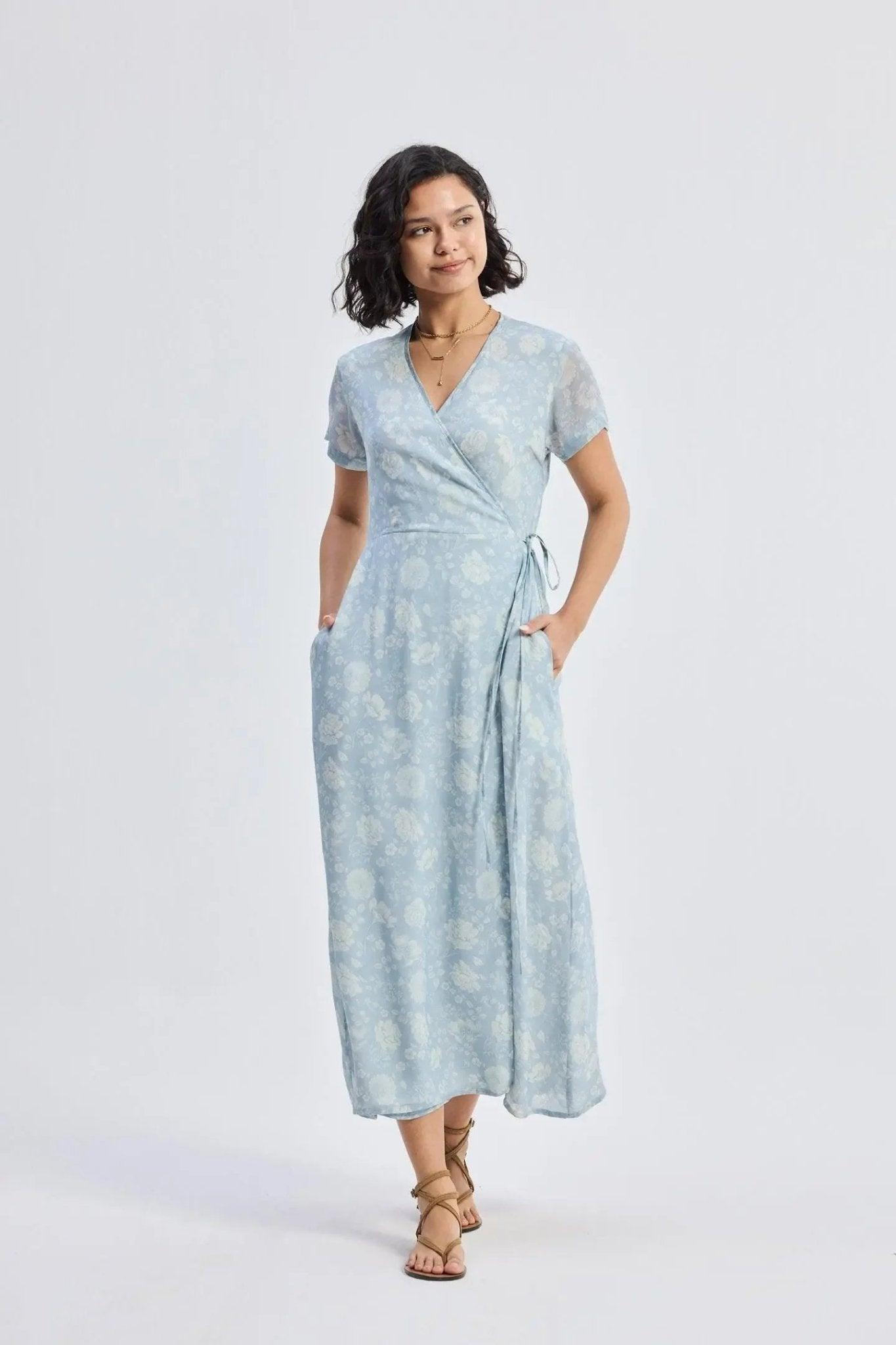 Light blue floral wrap dress with short sleeves and V-neck, perfect for women's fashion