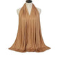 Elegant beige scarf draped on mannequin, perfect for women's fashion and beauty looks