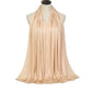 Elegant beige halter neck dress with flowing pleats, perfect for women's fashion