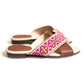 Women's flat sandals with pink and gold embroidered straps, brown leather accents, stylish summer footwear