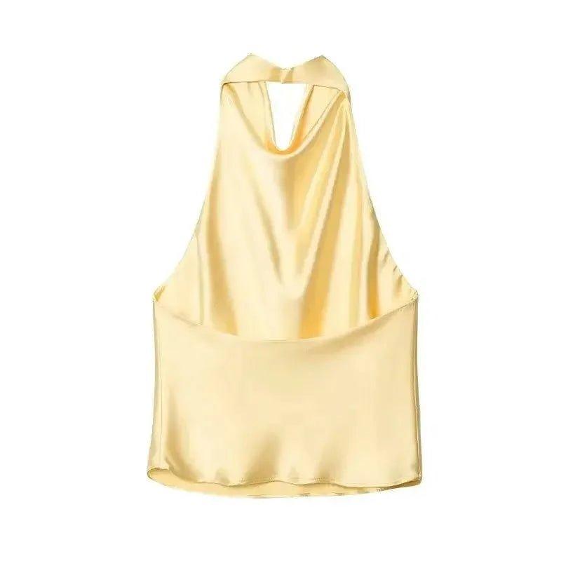 Elegant yellow satin halter top with draped neckline, perfect for women's fashion and stylish outfits.