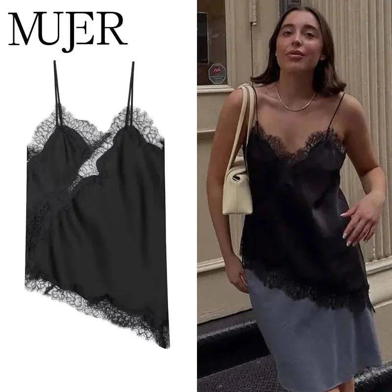 Black lace-trimmed satin camisole for women's fashion, styled with denim skirt and beige bag