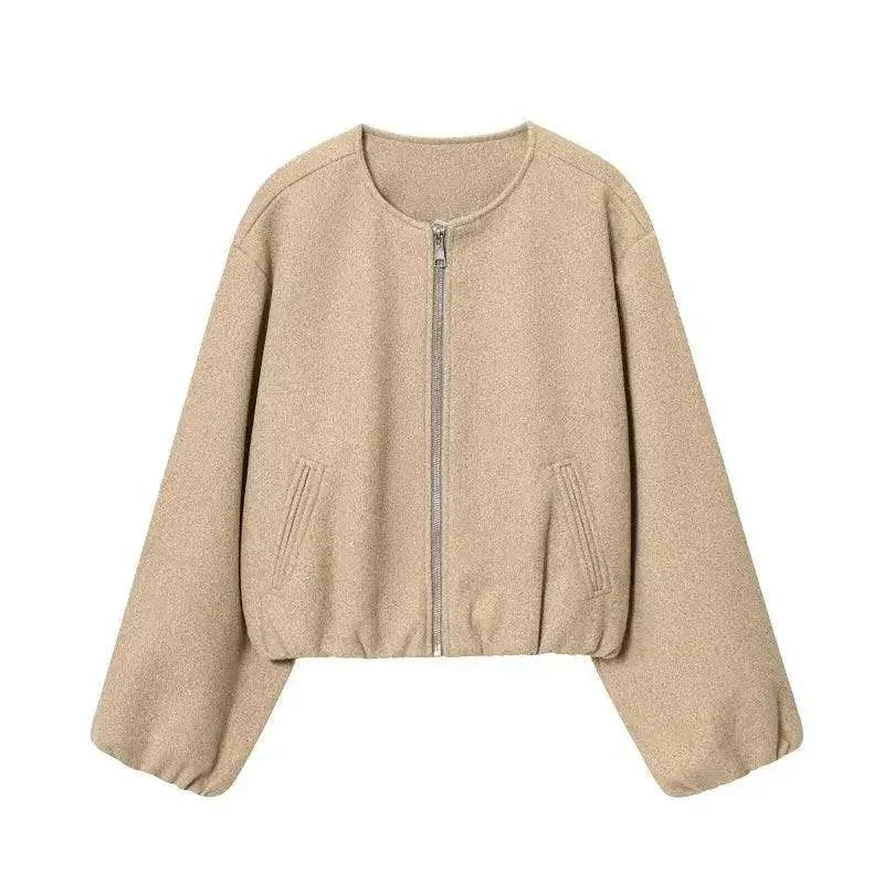 Beige women's cropped bomber jacket with front zipper and side pockets, stylish fashion outerwear