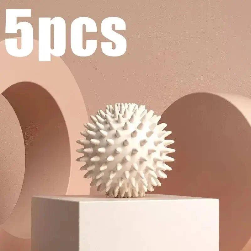 White spiky massage ball for muscle relief, 5pcs set on minimalist stand