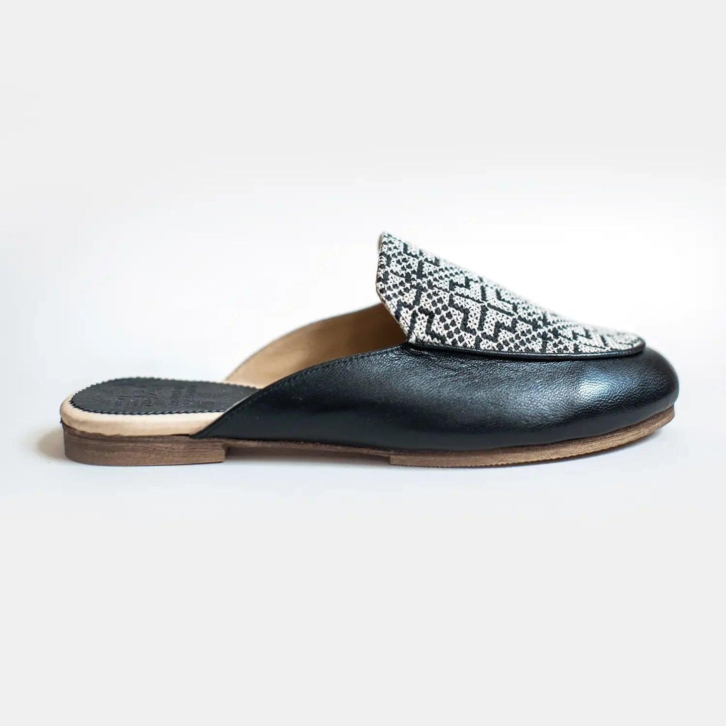 Black leather mule with geometric patterned toe, flat sole, women's fashion footwear