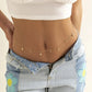 Gold star belly chain for women, fashion waist accessory with denim shorts