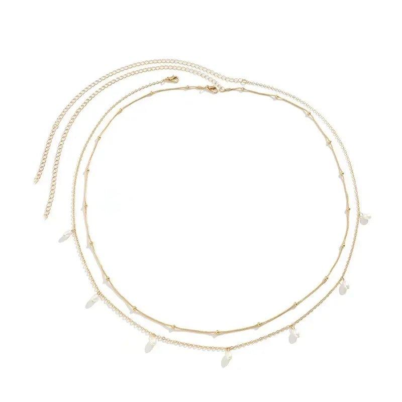 Delicate gold layering necklace with pearl drops, perfect for women's fashion and everyday elegance.